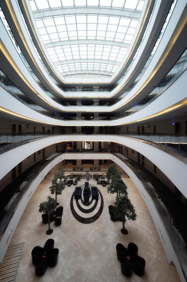Titanic Hotel & Spa Sulaymaniyah Exterior photo The atrium